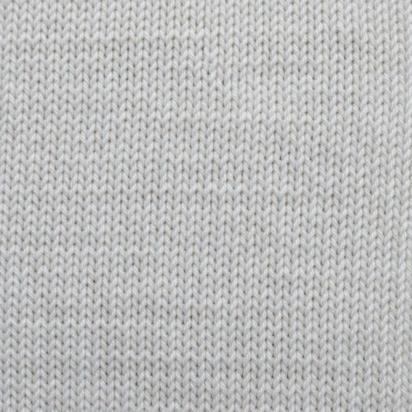 Square macro of single jersey cotton knit showing small V-shaped stitches