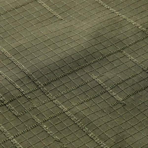 Square macro of olive ripstop fabric with a raised reinforcing grid